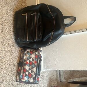 The honest company vegan leather diaper bag and skip hop diaper changer